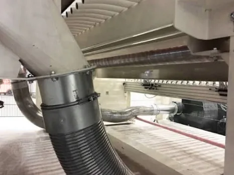 Corrugator trim removal ducting and blower connection under the slitter-scorer