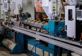 Extruder barrel, heater zones and gearbox on a plastics extrusion line