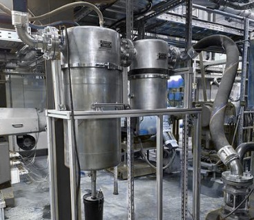 Utility vacuum vessels, piping and pump drive in a plastics plant